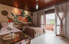 Quarto Quádruplo de Luxo do Pousada Santo Antonio