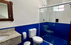 TRIPLO TÉRREO COM VARANDA do Pousada Recanto Das Cores.
