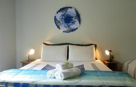 Quarto Triplo com Vista do Jardim do Pousada do Pequi