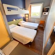 Apartamento com 3 Camas de Solteiro