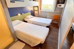 Apartamento com 3 Camas de Solteiro