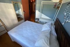 Room with shared bathroom
