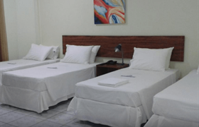Quarto Premium Quádruplo Solteiro  do Nobile Plaza Hotel