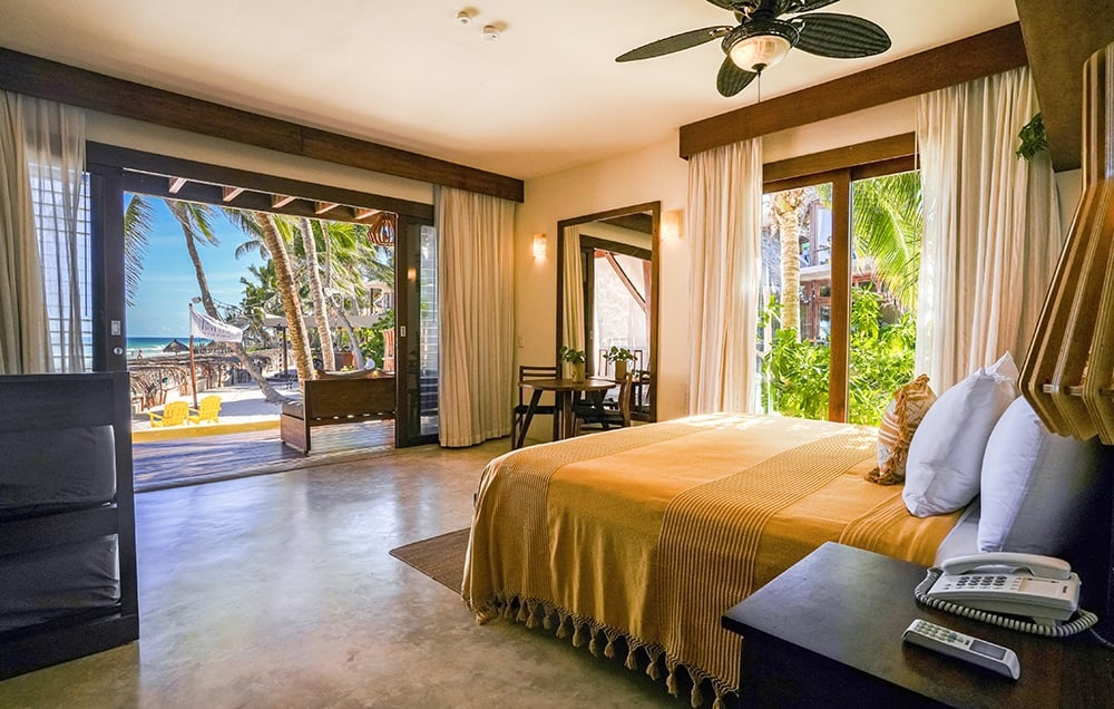 Beach Front Ground Level Suite With Plunge Pool - 3 room view.jpg