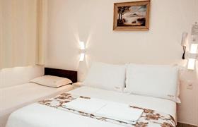 Quarto Família Econômico do Hotel Cabana Suica