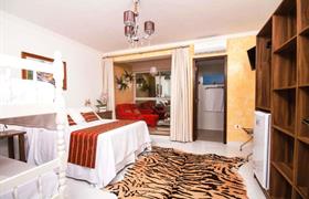 Quarto Quádruplo Deluxe do Hotel Cabana Suica