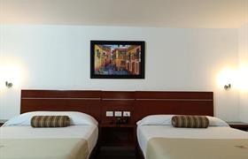 Double Room with Two Double Beds of Grand City Hotel