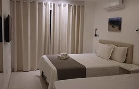 Quarto Triplo com Varanda de Frente do Pousada Areia dos Anjos