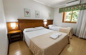 Quádruplo Deluxe do HANNA Portico Hotel Gramado