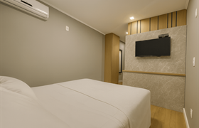 Quarto Deluxe do Eleganz Suites Excluisve 