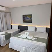 Apartamento Triplo com Varanda