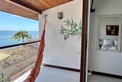 Suíte Luxo Quadruplo com Varanda e Vista Mar