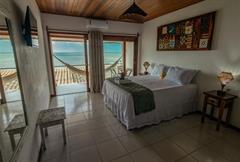 Quarto Duplo Com Varanda e Vista do Mar