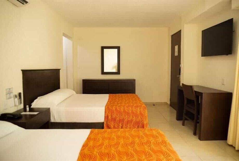 quarto com 2 camas de solteiro-1.jpg