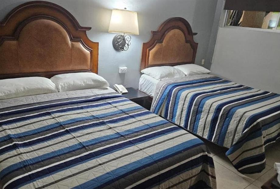 Quarto Duplo Standard com 2 Camas de Casal-7.jpg