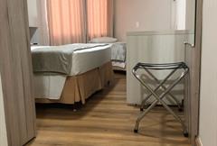 Casal com cama extra Luxo