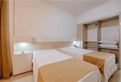 Superior casal com cama extra