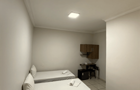  Quarto com 3 camas de solteiro do Hotel Astoria Palmas