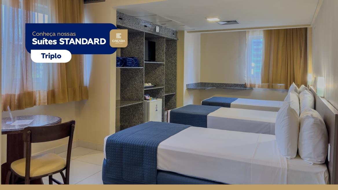 hc - suíte standard triplo - tv 01.jpg