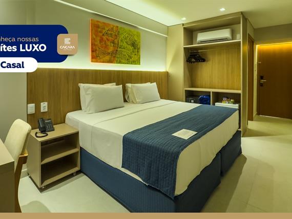 hc - suíte luxo casal - tv 01.jpg