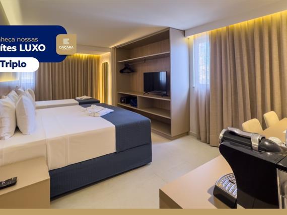 hc - suíte luxo triplo - tv 01.jpg