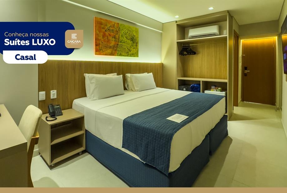 hc - suíte luxo casal - tv 01.jpg