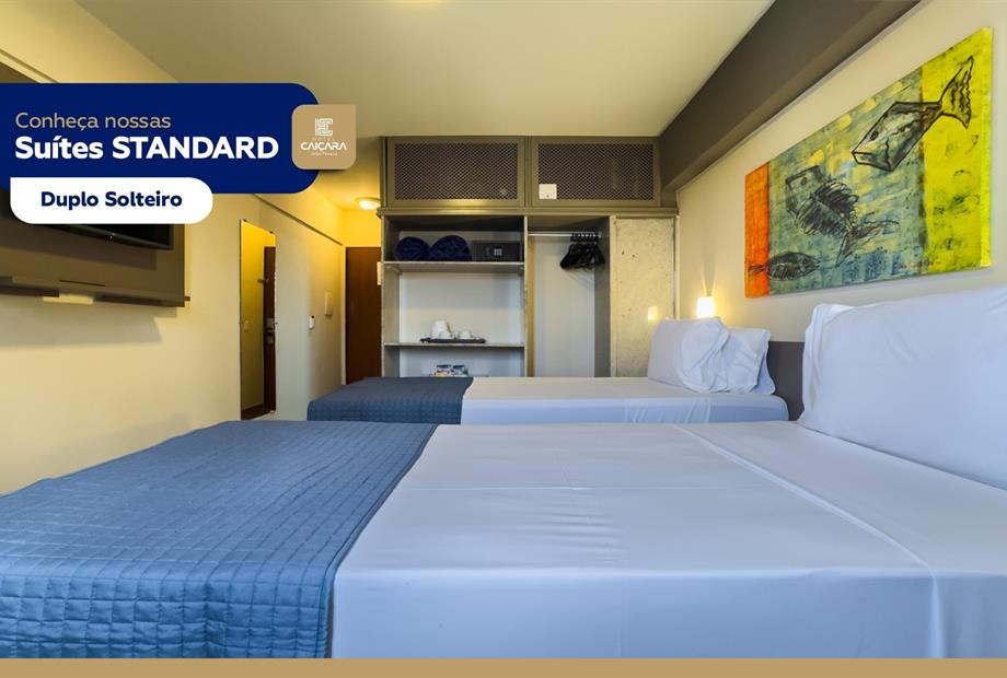 hc - suíte standard duplo solteiro - tv 02.jpg