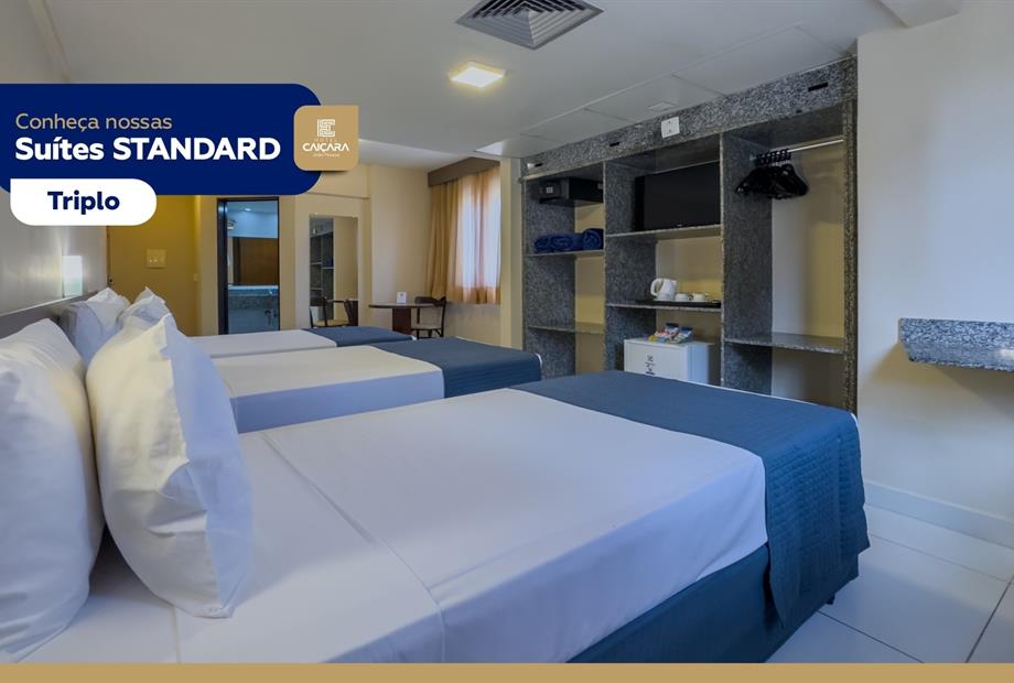 hc - suíte standard triplo - tv 02.jpg