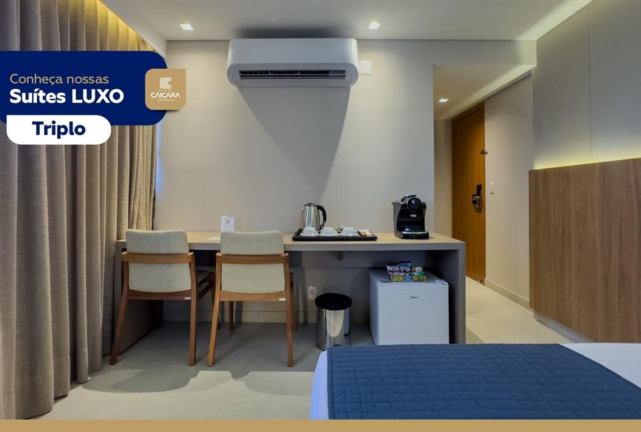 hc - suíte luxo triplo - tv 03.jpg