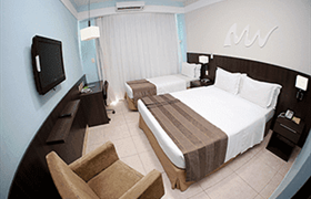 Triplo Casal Vista Cidade 1CHD free na mesma cama com os pais do Real Classic Hotel