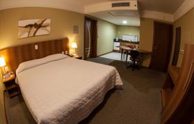 Triplo Superior do TRI Hotel Executive Caxias