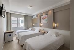 Quarto Triplo Executivo