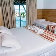Luxo Frente Mar Triplo