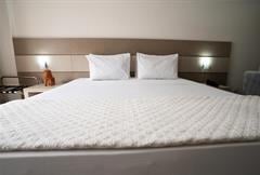 Suite Junior Varanda Lateral 26m² (Cama Casal)