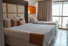 Suíte Frente Mar Triplo com Varanda 32m² (Cama Casal+1 ou 3 box twin)