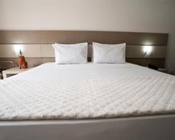 Suite Junior Varanda Lateral 26m² (Cama Casal)