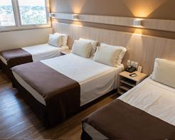 Suíte Quadrupla (1x Casal + 2x Solteiro)