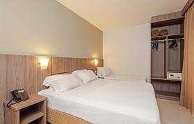 Pareja superior estándar con cama adicional de Slim Hotel Curitiba Av. das Torres