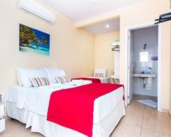 Suíte Prédio Anexo para 03 pessoas outro lado da rua