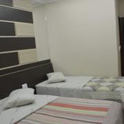 Suíte Luxo Triplo Cama Casal e 1 Solteiro