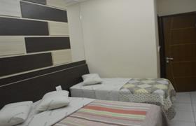 Suíte Luxo Triplo Cama Casal e 1 Solteiro do Hotel Calstar												