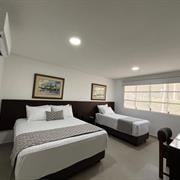 Habitacion Triple Cama Doble + Sencilla