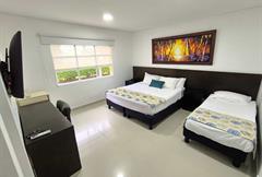 Habitacion Triple Cama Doble + Sencilla