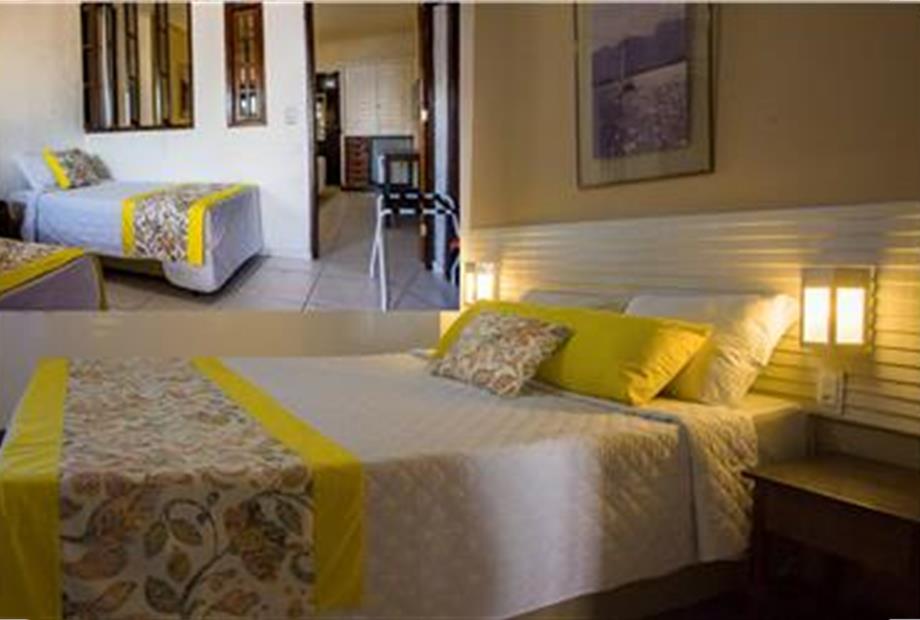 Quarto conjugado com vista mar