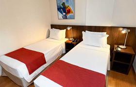 Adapted Twin of Royal Design Savassi Hotel | MG