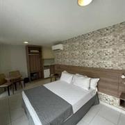 Quarto Luxo Cama de Casal com Varanda