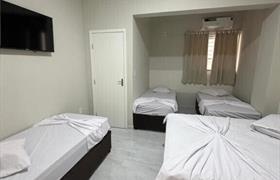 Quarto Familia do Hotel Pousada Romanos