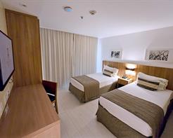 SUPERIOR TWIN - Vista Lateral Mar com Varanda  - 2 camas de solteiro