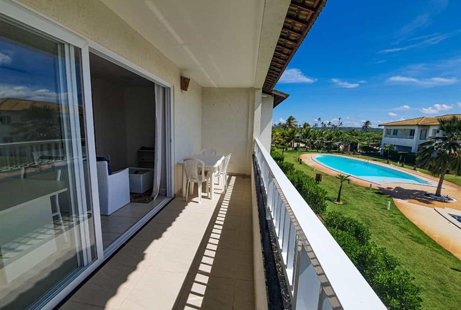 Varanda com vista para as piscinas Ap 53.jpeg
