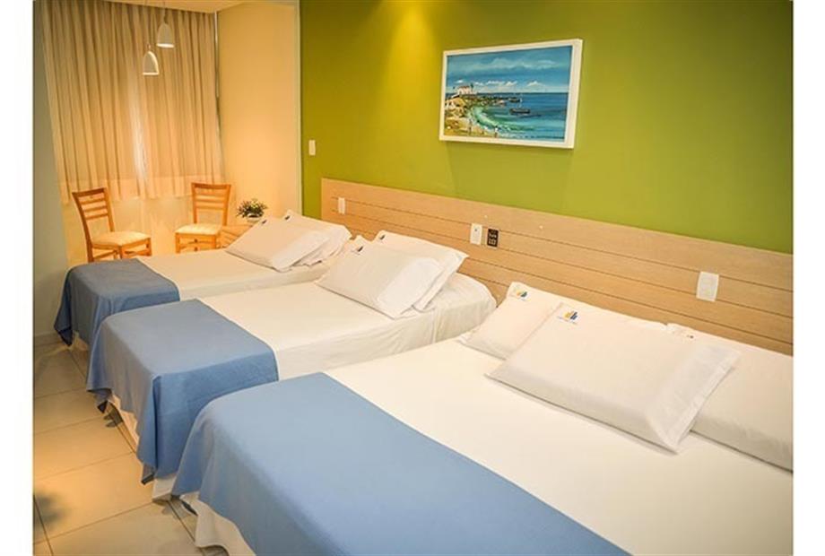 Casal+2 solteiros com Vista para o Mar